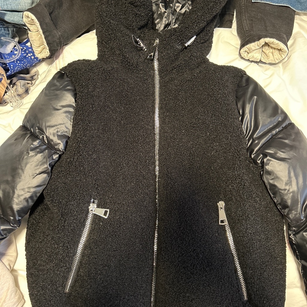 Brand new Calvin Klein black puffer with hood